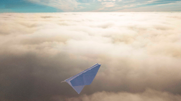 Paper plane above clouds 2
